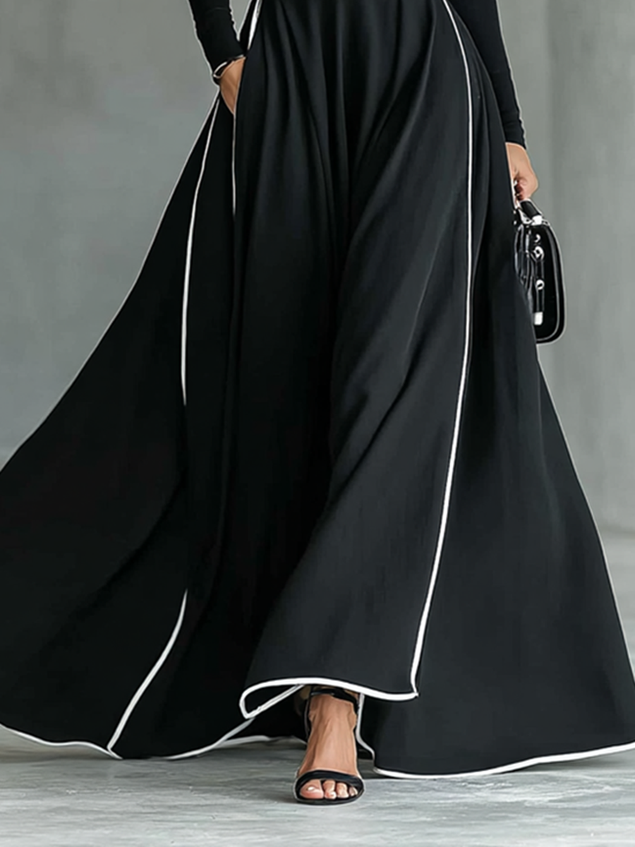 Gina – Vestido Maxi Negro con Costuras Blancas y Cuello Alto